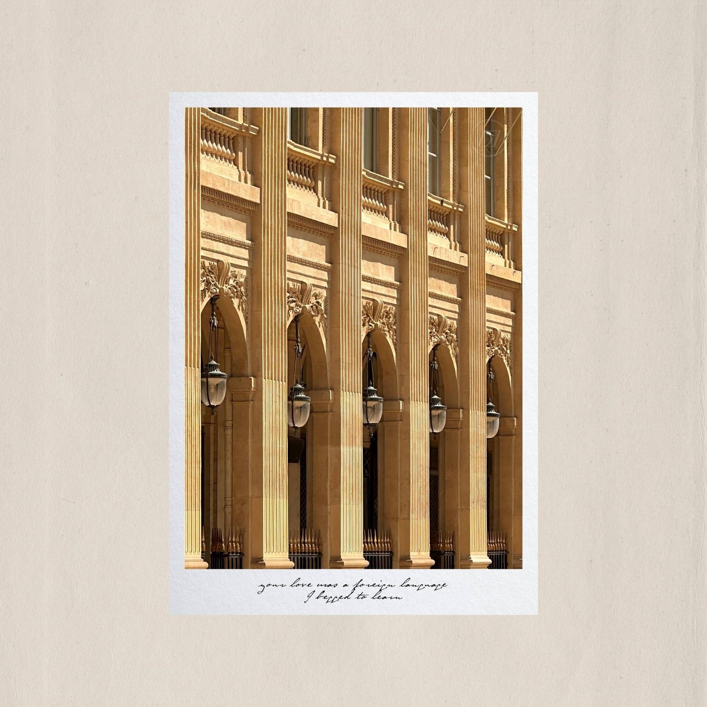 The rhythmic arches and fluted columns of Palais Royal bathed in warm Parisian light – Des Épigraphes. Captured by Tolga Avan.