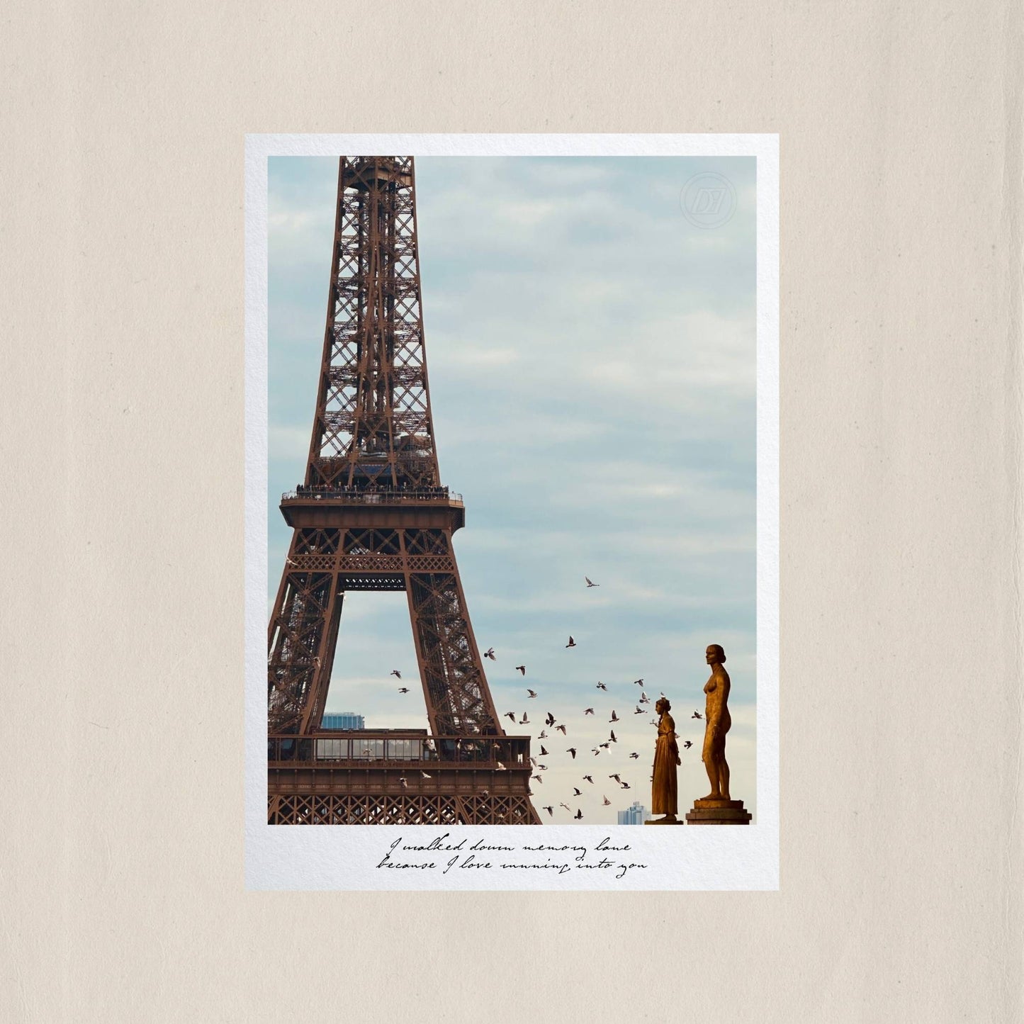 The iron silhouette of the Eiffel Tower rising above the golden statues of Trocadéro, as birds scatter across a Parisian sky – Des Épigraphes. Captured by Tolga Avan.