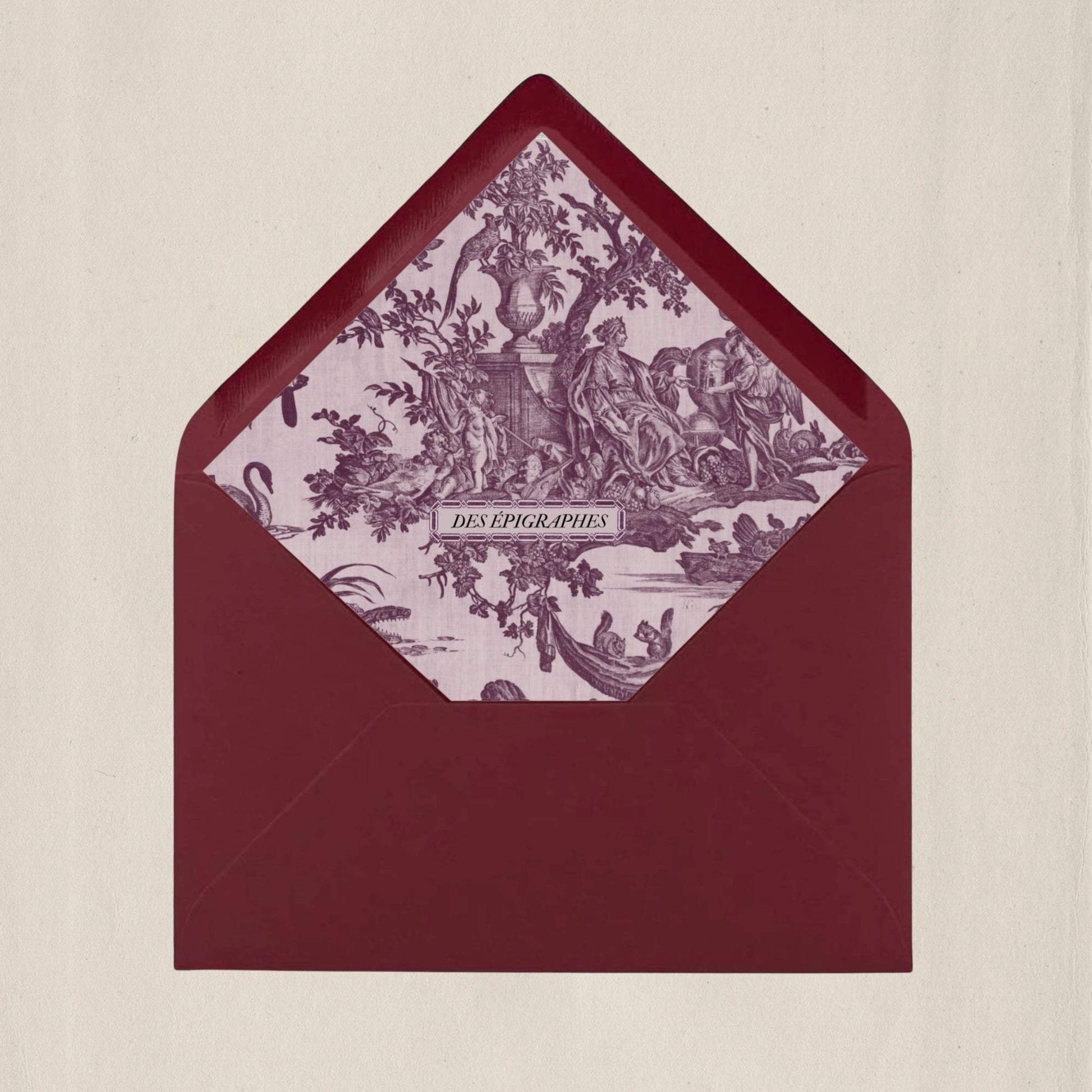Crimson red Des Épigraphes envelope lined with historic Toile de Jouy fabric, a tribute to timeless craftsmanship.