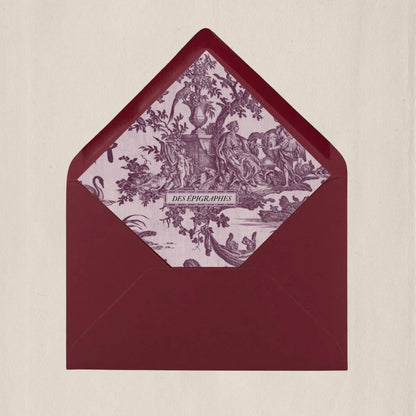Crimson red Des Épigraphes envelope lined with historic Toile de Jouy fabric, a tribute to timeless craftsmanship.