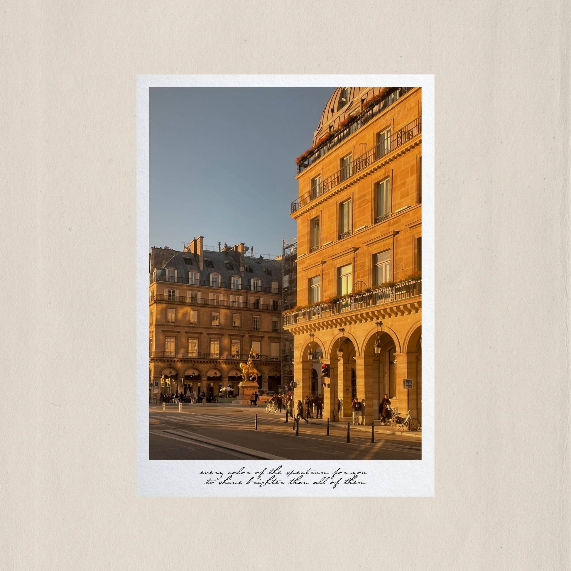 The gilded facades of Rue de Rivoli ablaze at sunset, with the golden statue of Jeanne d'Arc standing watch over Place des Pyramides – Des Épigraphes. Captured by Tolga Avan.