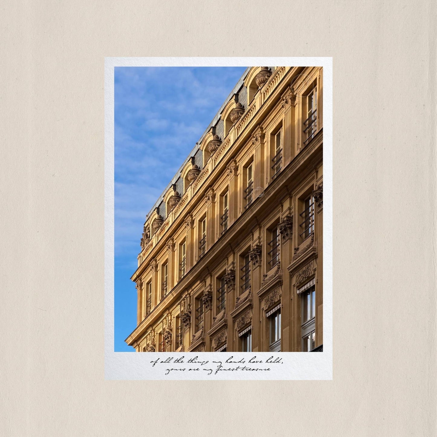 The ornate Haussmannian facade of a Parisian building catching the last light of the afternoon sun – Des Épigraphes. Captured by Tolga Avan.