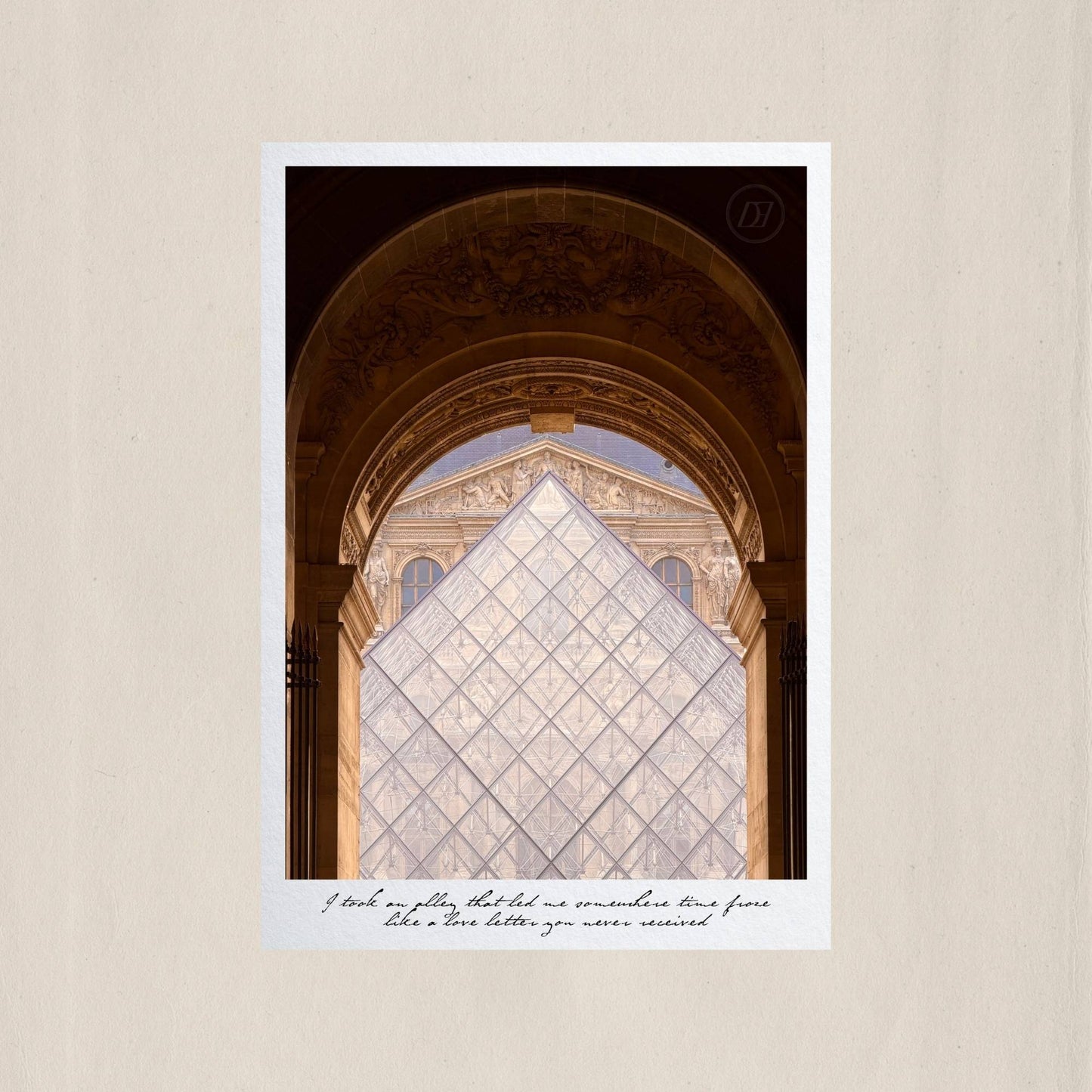 The glass pyramid of the Louvre framed perfectly within a stone arcade, where old Paris and new Paris meet – Des Épigraphes. Captured by Tolga Avan.