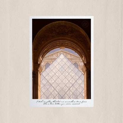The glass pyramid of the Louvre framed perfectly within a stone arcade, where old Paris and new Paris meet – Des Épigraphes. Captured by Tolga Avan.