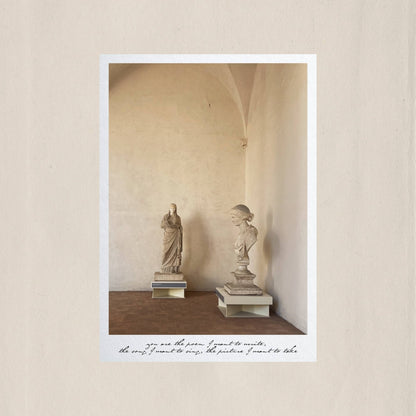 Two figures in quiet dialogue beneath the vaulted halls of a Roman museum – Des Épigraphes. Captured by Tolga Avan.